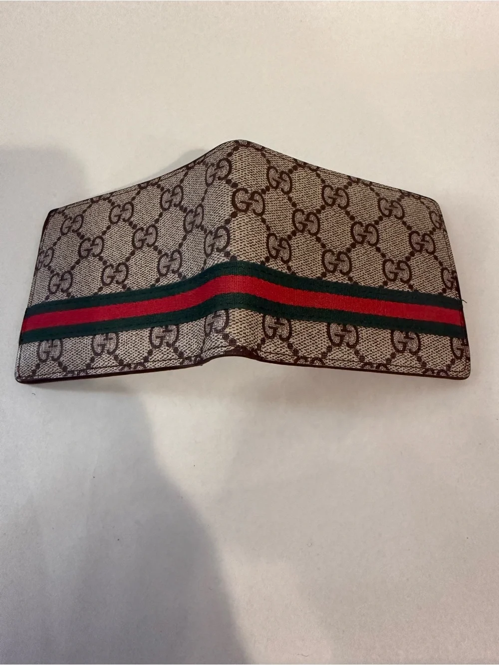 GUCCI Brown GG Supreme Canvas Bifold Wallet Pre-owned.
